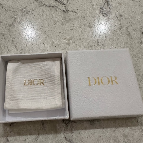 White crystals, 'DIOR' signature, gold-finish metal, hook clasp, sold as a pair. - Picture 3 of 6